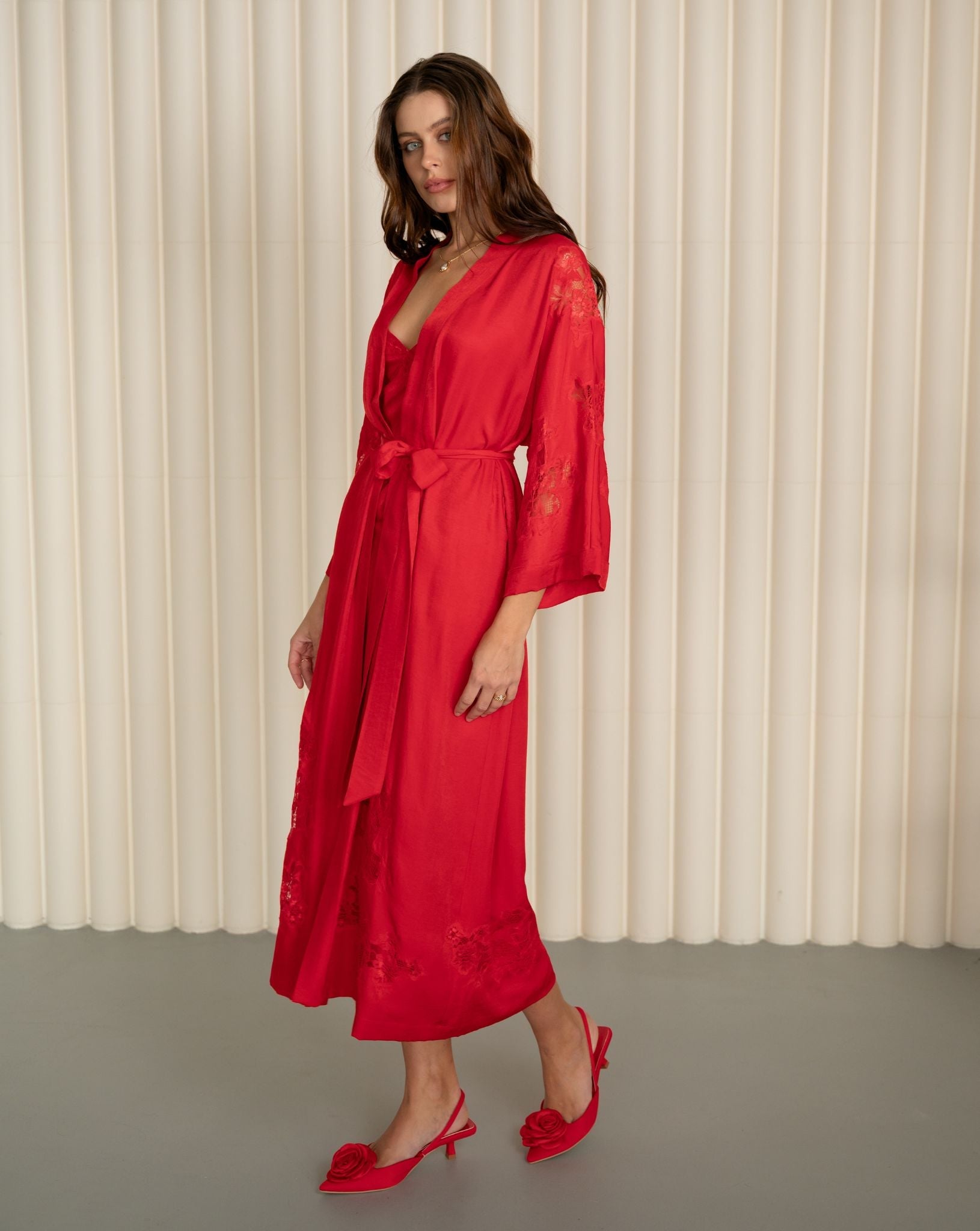 lowing Robe and Nightgown Set captured in motion, featuring the wrap-over style and ankle-length design.