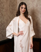 Mid-length shot of the layered ensemble, illustrating the fusion of comfort and dramatic elegance.