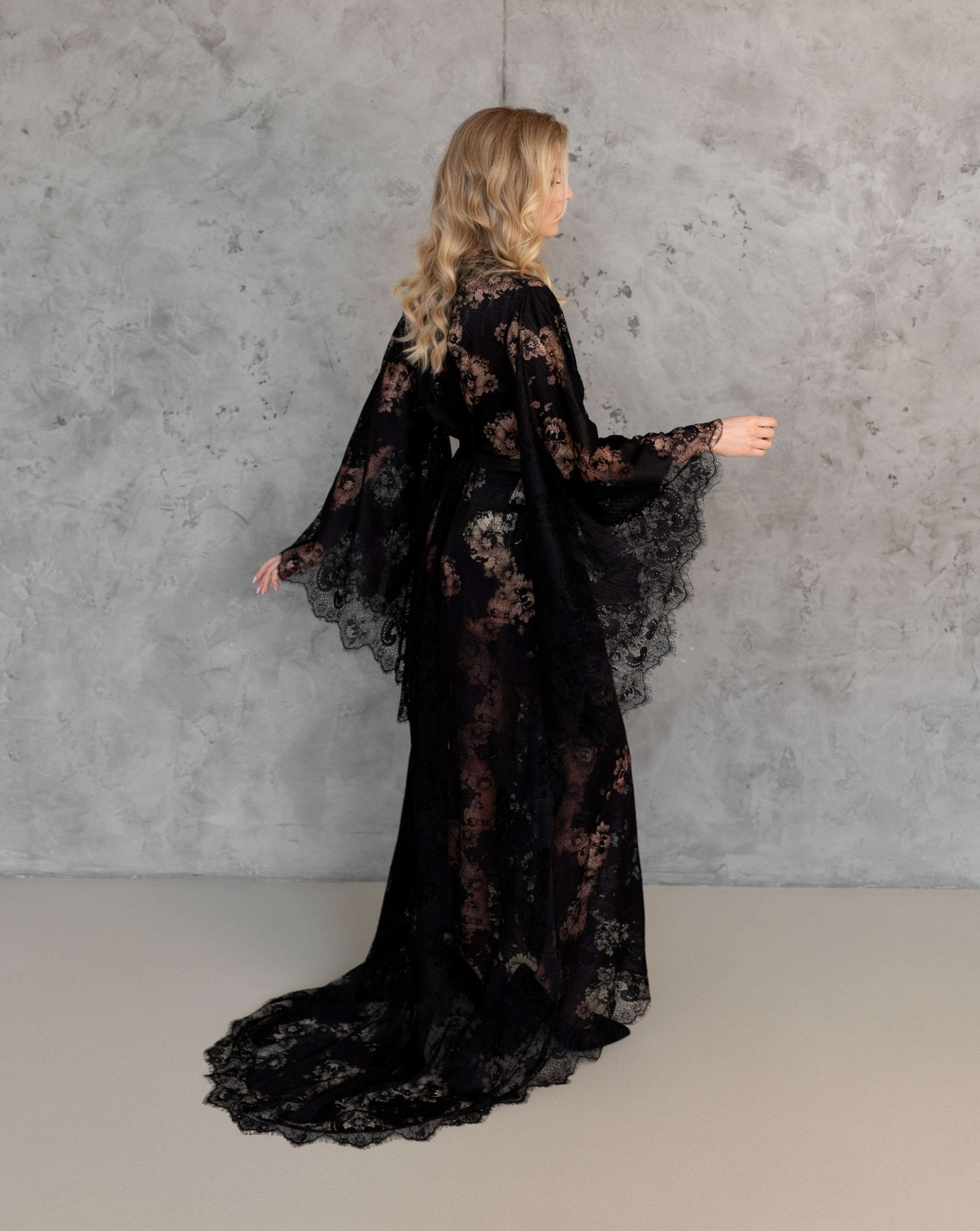 Back view of black lace robe with bell sleeves, floor-length – KÂfemme