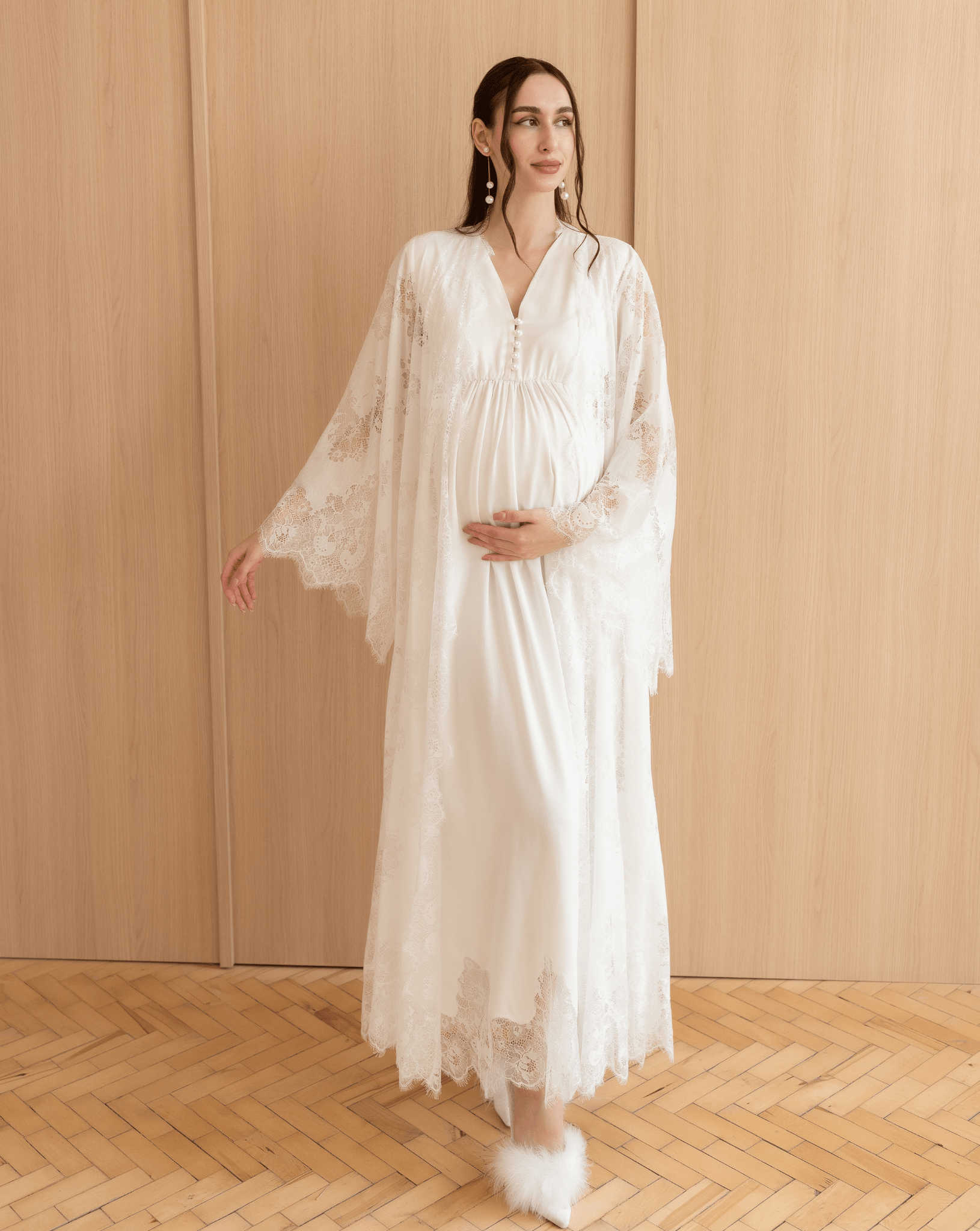 Kafemme robe and gown set, standing in soft light