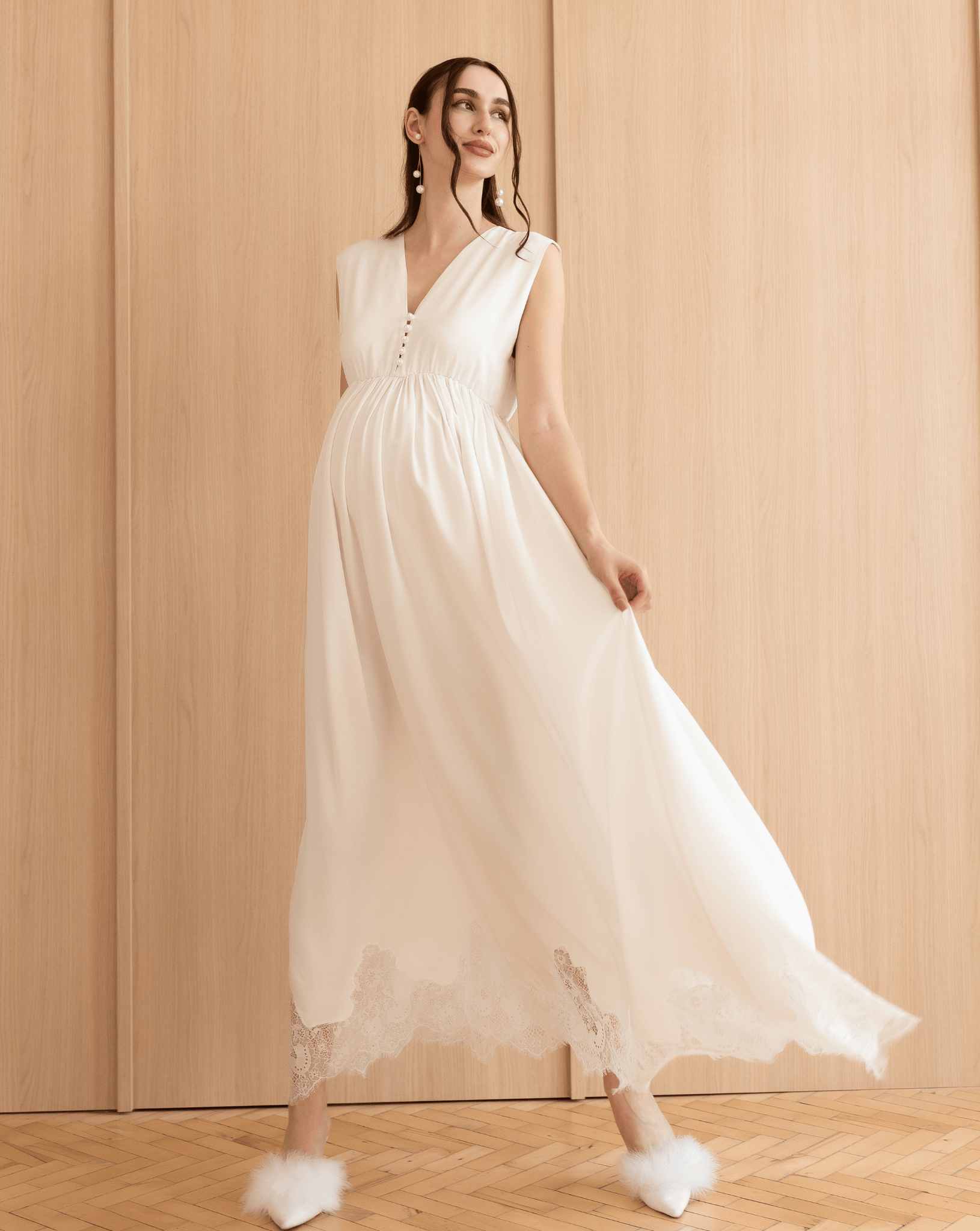 Kafemme ivory maternity nightgown in motion, walking forward