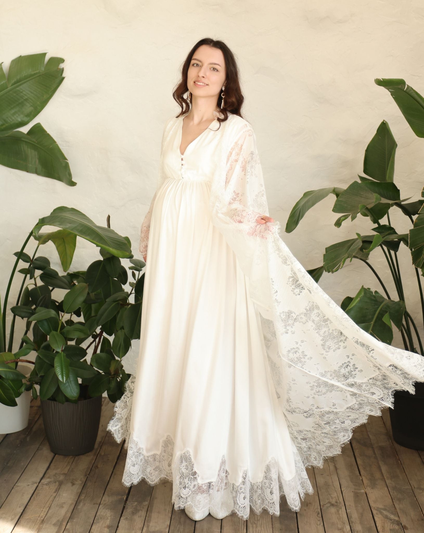 A spirited shot of the flowing lace hem as it twirls, capturing the sense of quiet luxury and effortless grace.