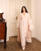 A dynamic view of the Cotton Robe and Nightgown Set in motion, capturing the ethereal finish and graceful movement.