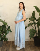 Side perspective of the cotton nightgown, showcasing the gentle elastic under the bust for maximum comfort.