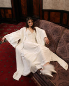 A poetic view of the Velvet Robe and gown, capturing the essence of elegant lounging and private indulgence.