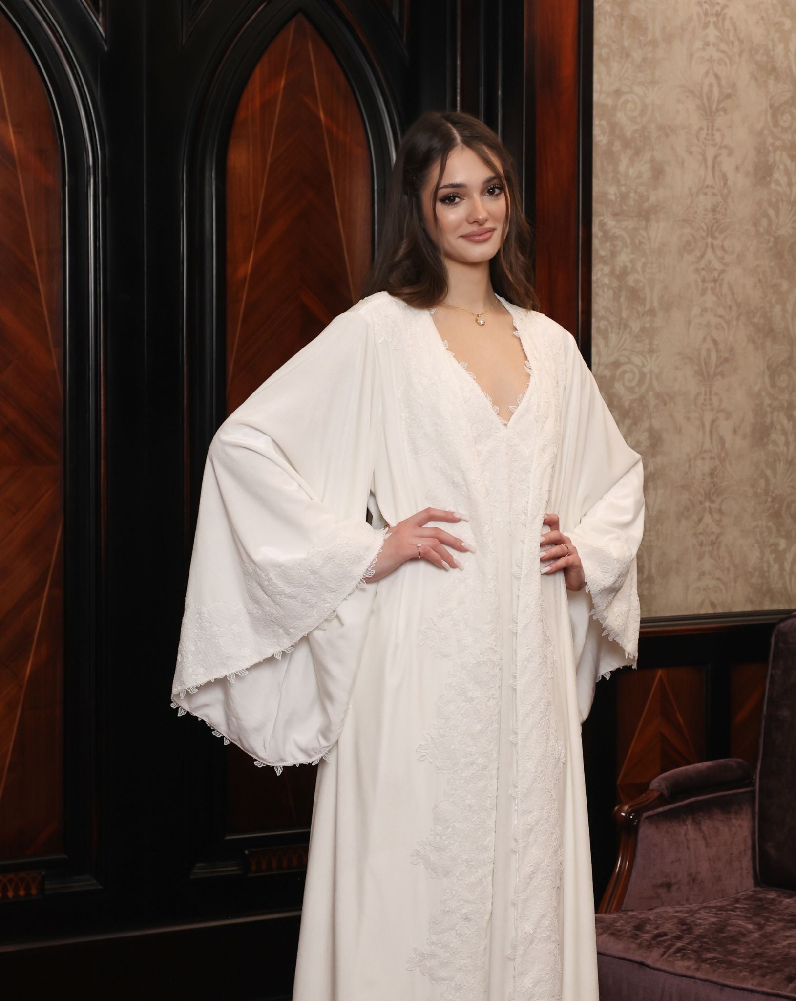 Mid-length view of the kimono style wrap, embellished with cotton lace for a touch of effortless grandeur.