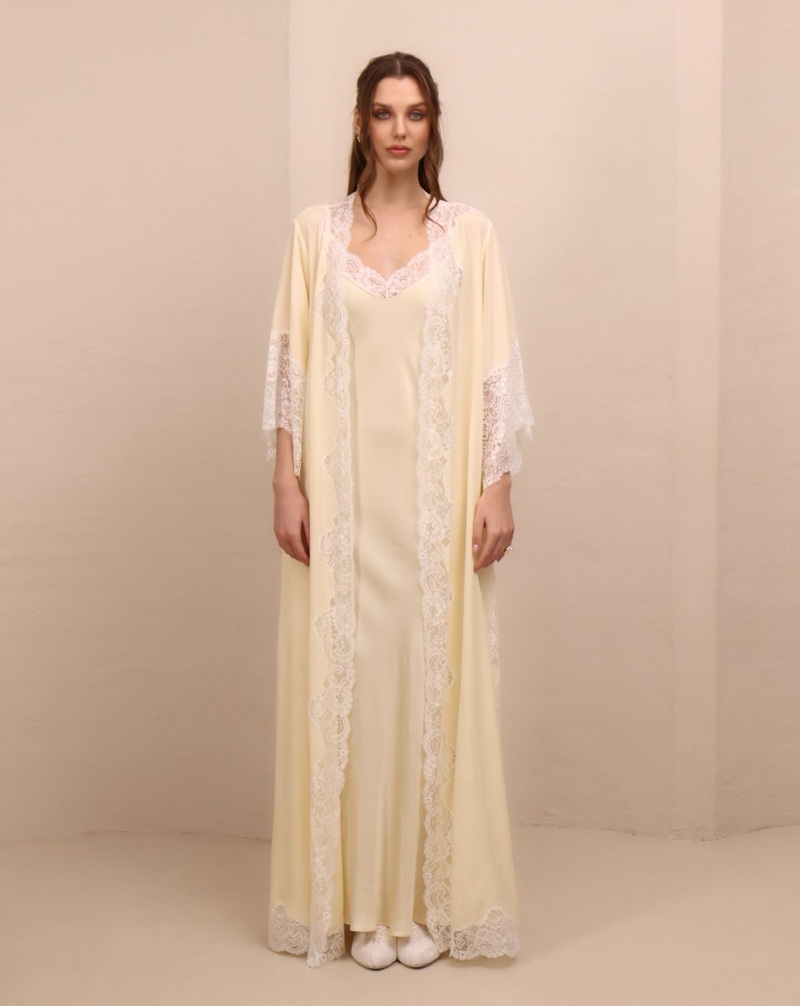 A serene static view of the Robe and Nightgown Set, celebrating femininity with a romantic harmony of textures.