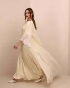 A dynamic side view of the Robe and Nightgown Set in motion, capturing the flowing chiffon and sweeping silhouette.