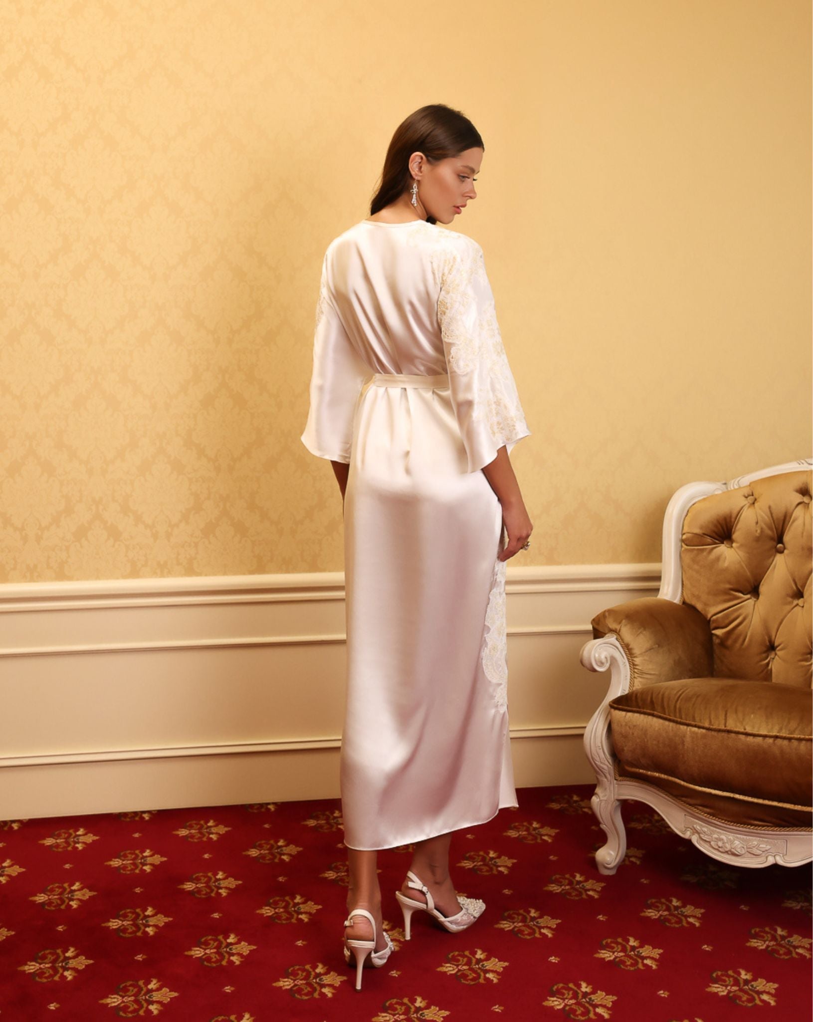 Model posing in kaftan with side slit and relaxed sleeves – KÂfemme
