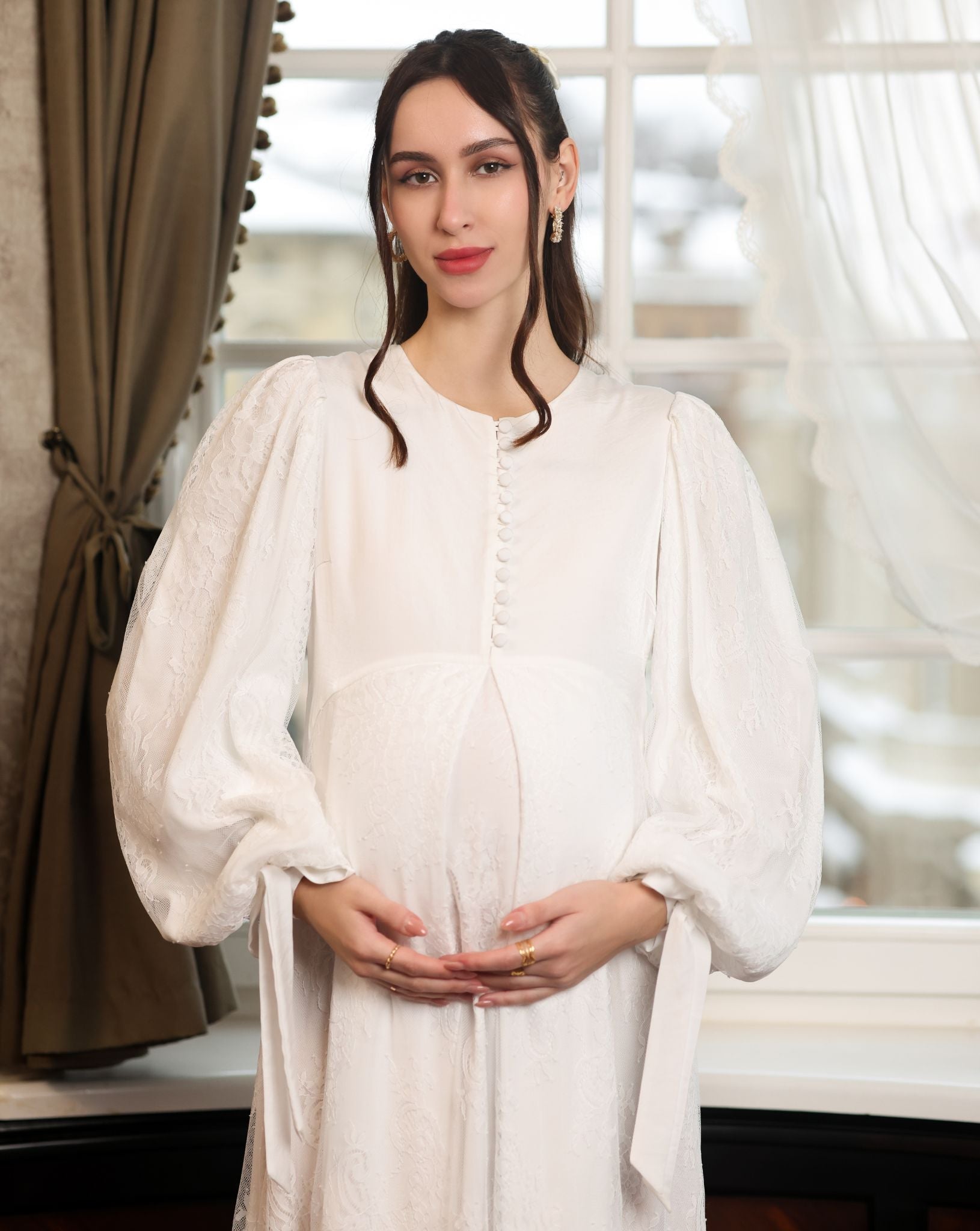 Mid-length shot of the Modest Lounge Dress, focusing on the sleeves fully embellished with soft, romantic lace.