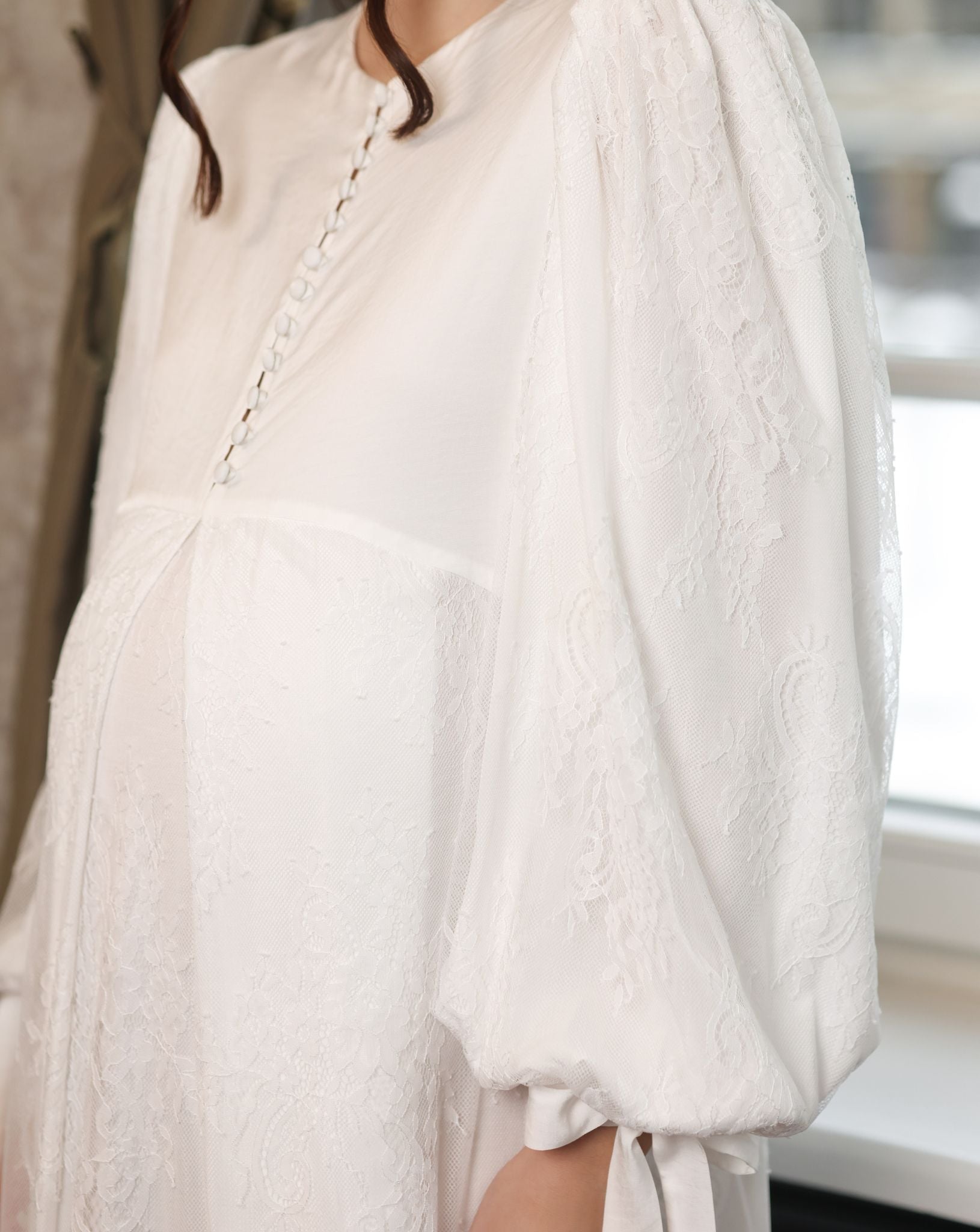 Mid-length shot of the Modest Lounge Dress, highlighting how the wide sleeves add grace to every movement.