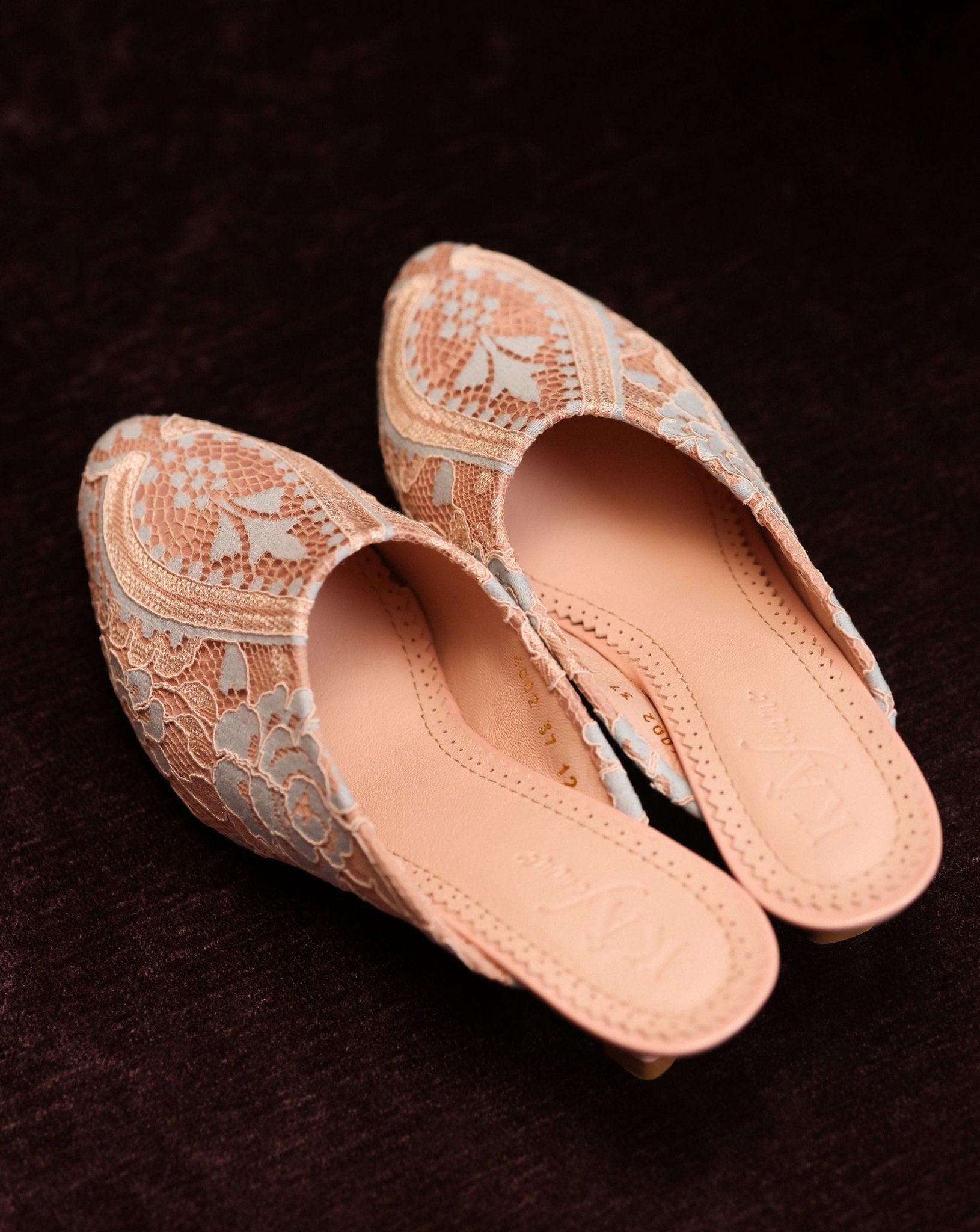 A clear view of the lace-adorned footwear, highlighting the soft padded insole and the quality of genuine leather.