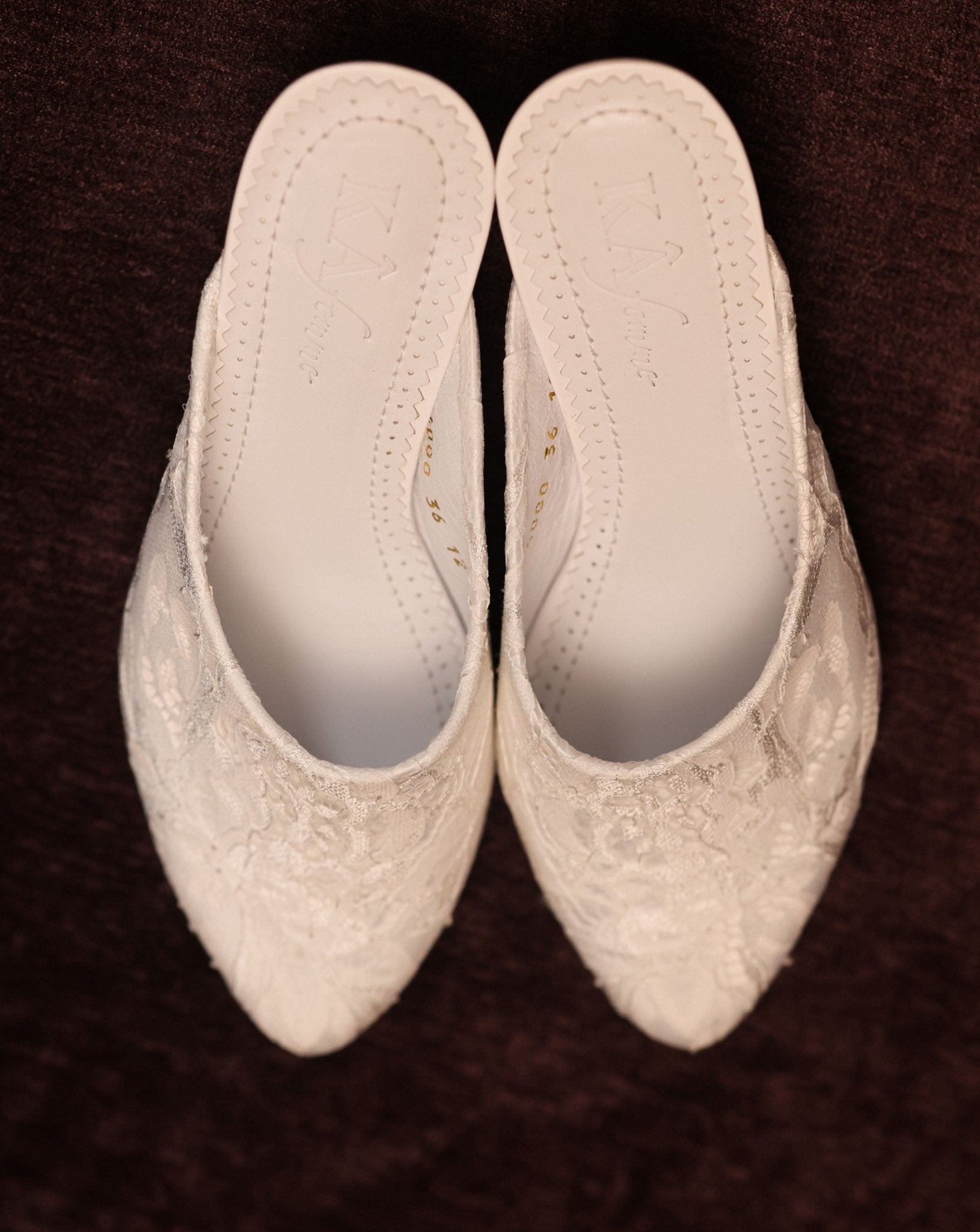 A clear view of the lace-adorned footwear, showcasing its structure, delicate materials, and graceful design.