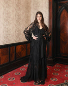 Full-length view of the Robe and Nightgown Set with hands on hips, showcasing sheer lace and bell sleeves.
