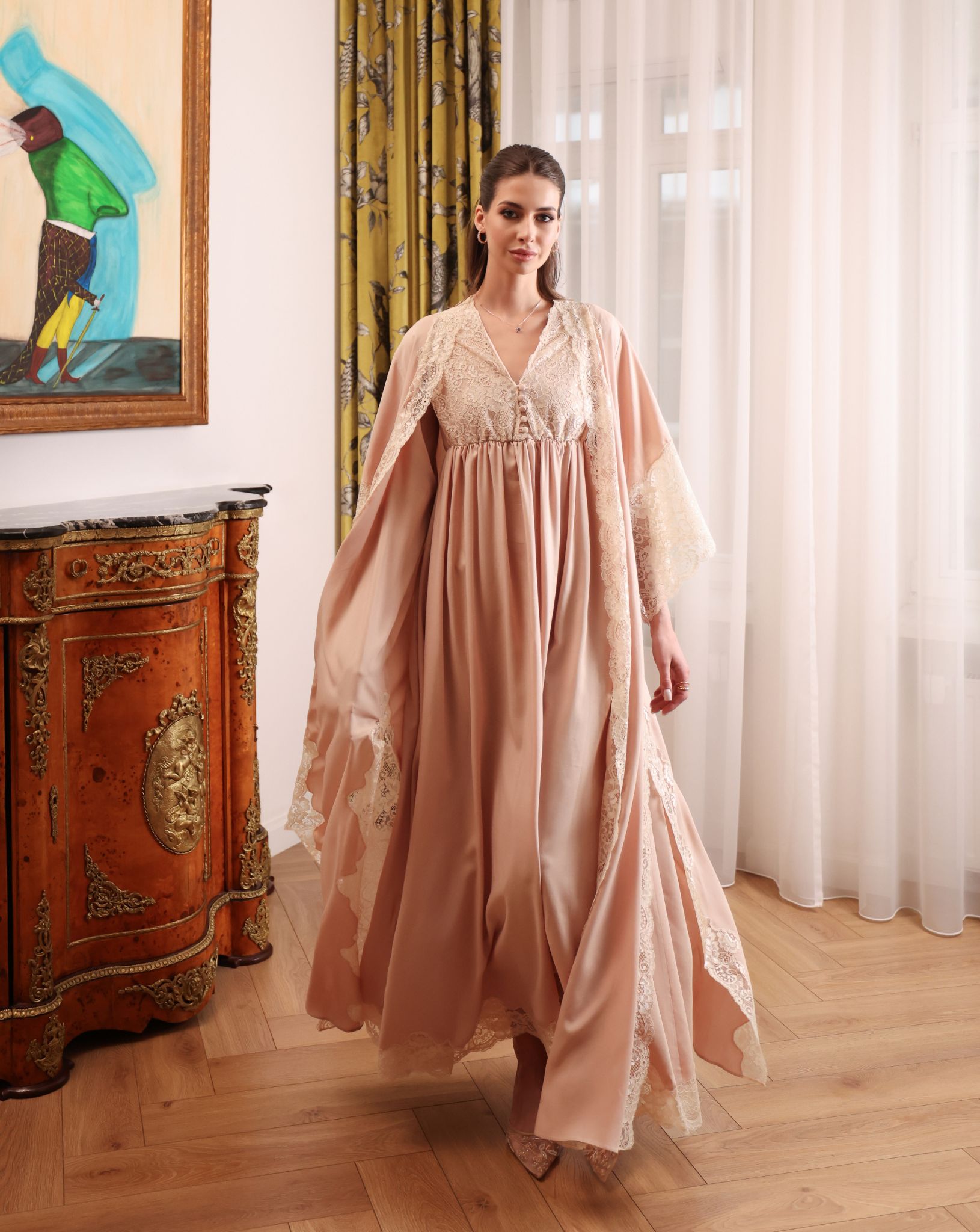 A full-length shot of the Robe and Nightgown Set in motion, capturing the flowing fabric and graceful silhouette.