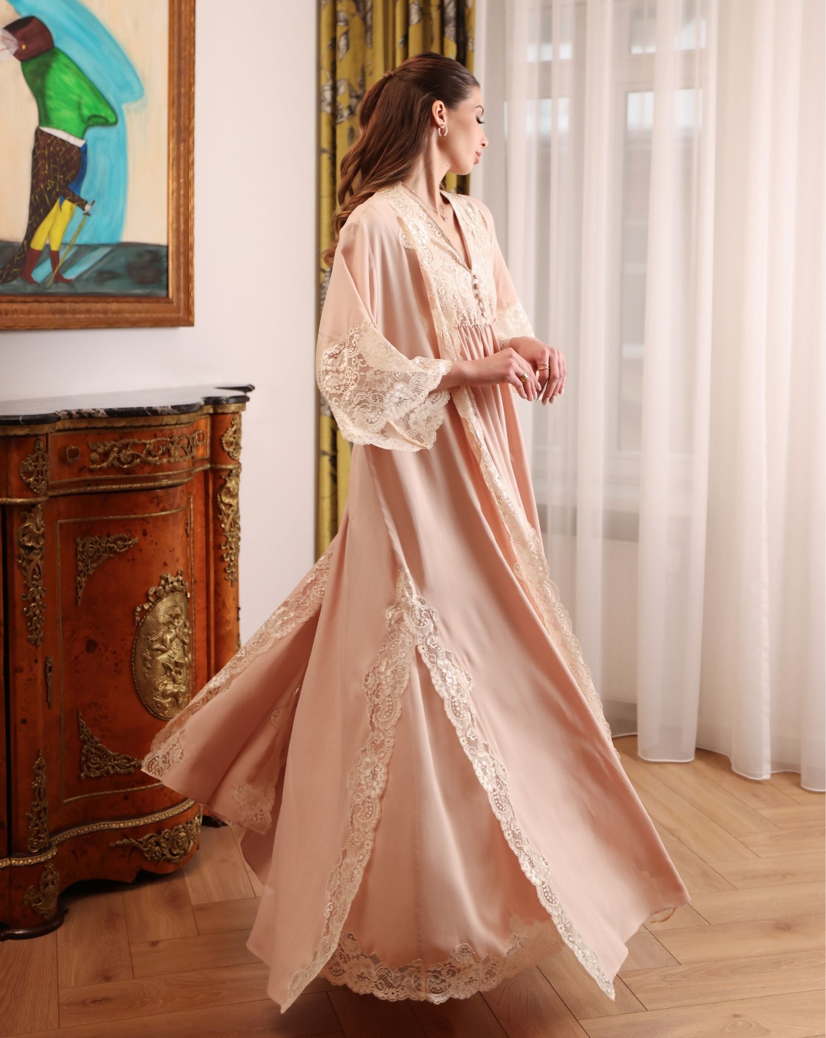A dynamic turn in the Robe and Nightgown Set, illustrating the reliable duo that understands a new mother's needs.