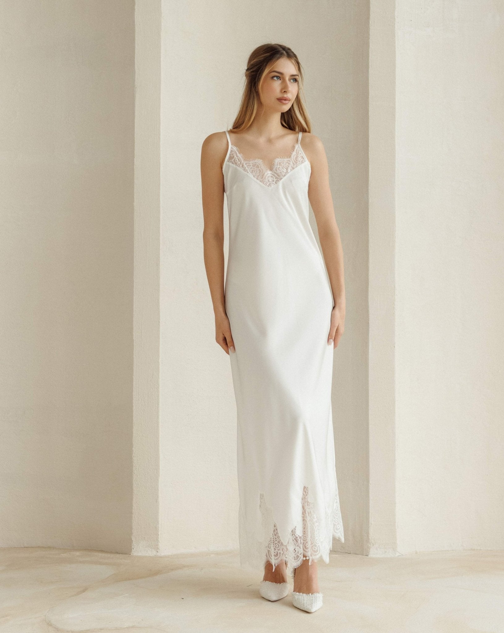 Front view of the white nightgown with a lace-trimmed neckline, showcasing a graceful and feminine fit.