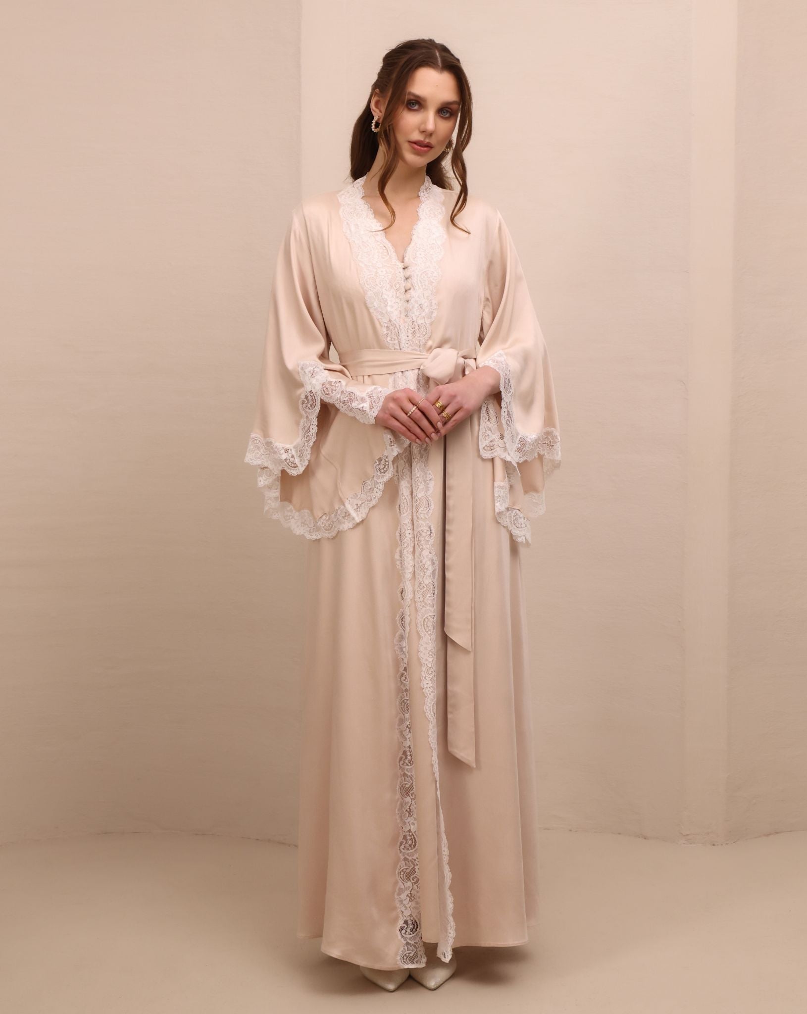 A serene static view of the attire, illustrating the thoughtful feminine design and freedom of movement.