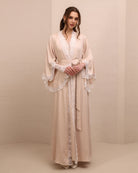 A serene static view of the attire, illustrating the thoughtful feminine design and freedom of movement.