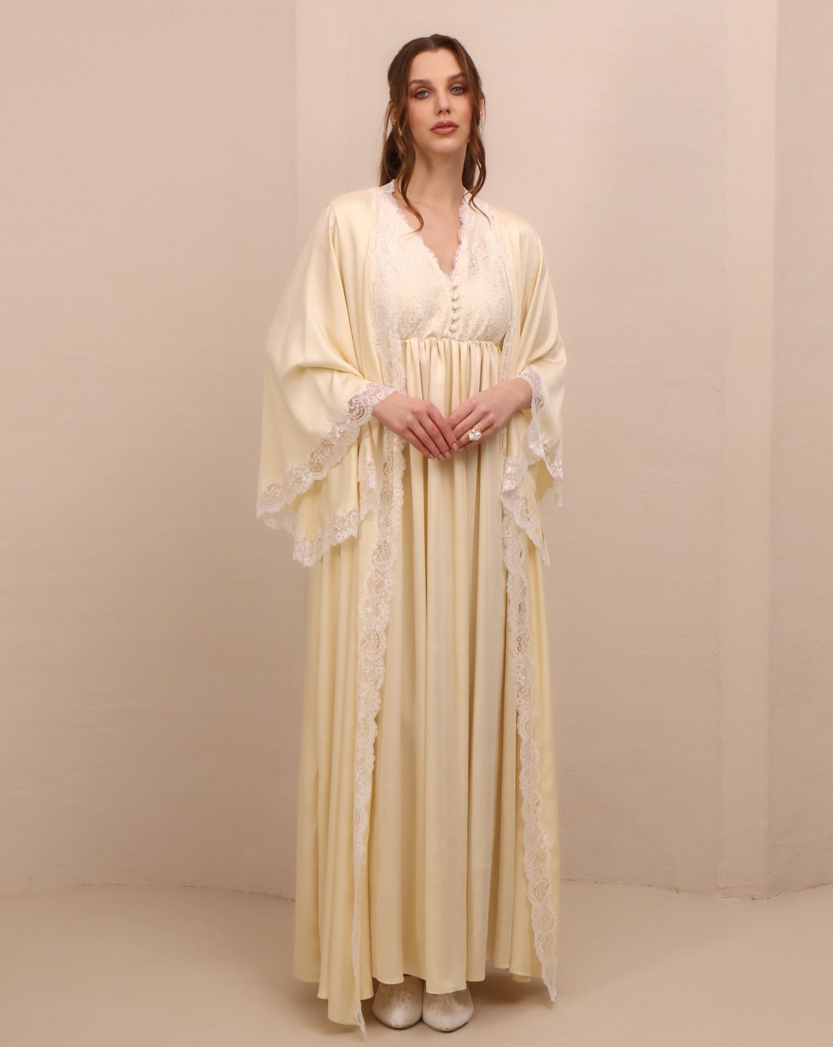 Side perspective of the set, highlighting the delicate lace trim and subtle slits for a touch of elegance.