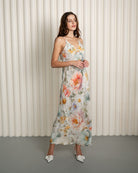 Side view of open-back floral silk nightgown