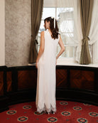 Back view of the nightdress, illustrating the gentle flow of the breathable material over the body.