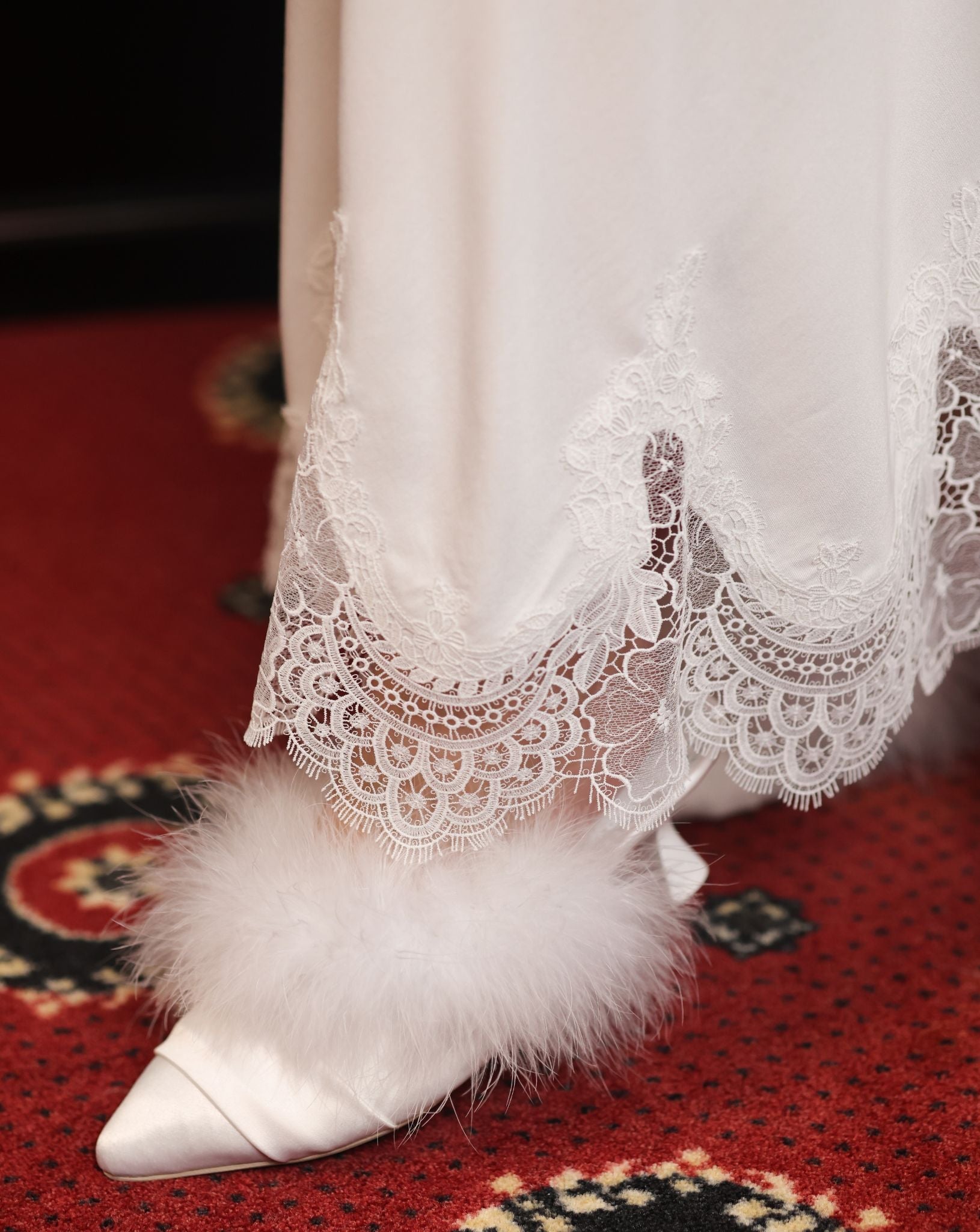 Detailed shot of the lace hem and leg, capturing the fine details and the airy touch of the romantic set.