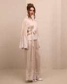 Side perspective of the set, illustrating the soft, adjustable silhouette that follows the body without restricting it.