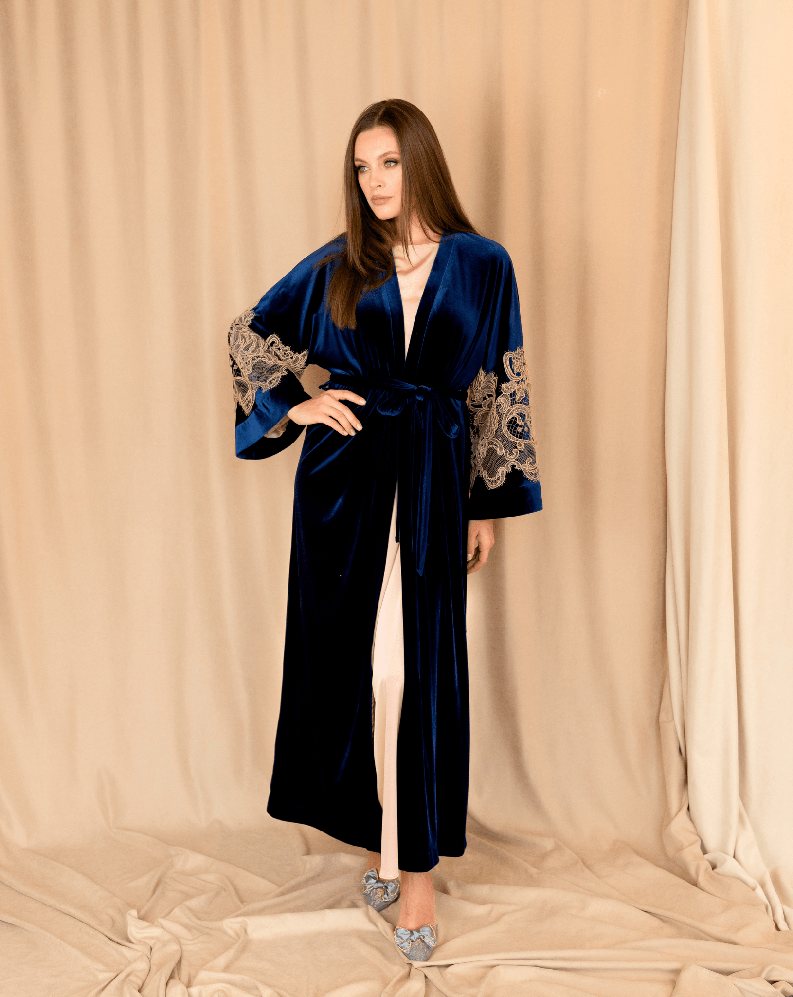 The complete set in a wrap-over style with a tie, showing a perfect pair of velvet and delicate lace.