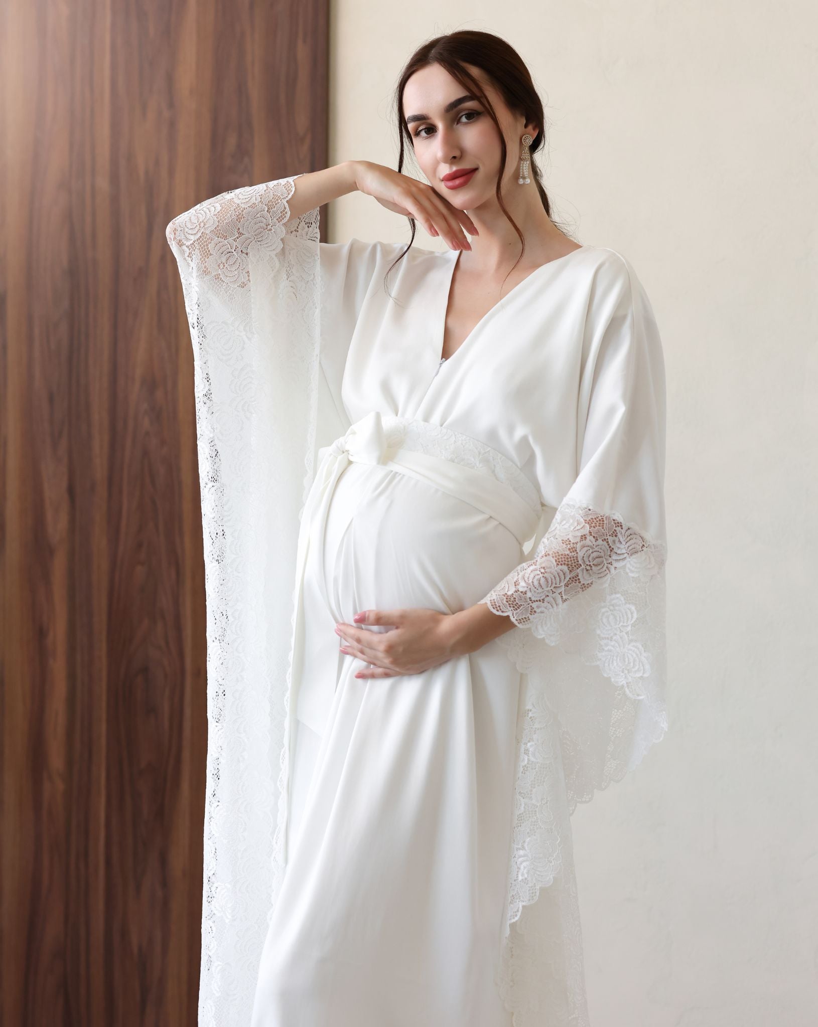 Flowing white cotton robe with long bishop sleeves, ideal for special moments.