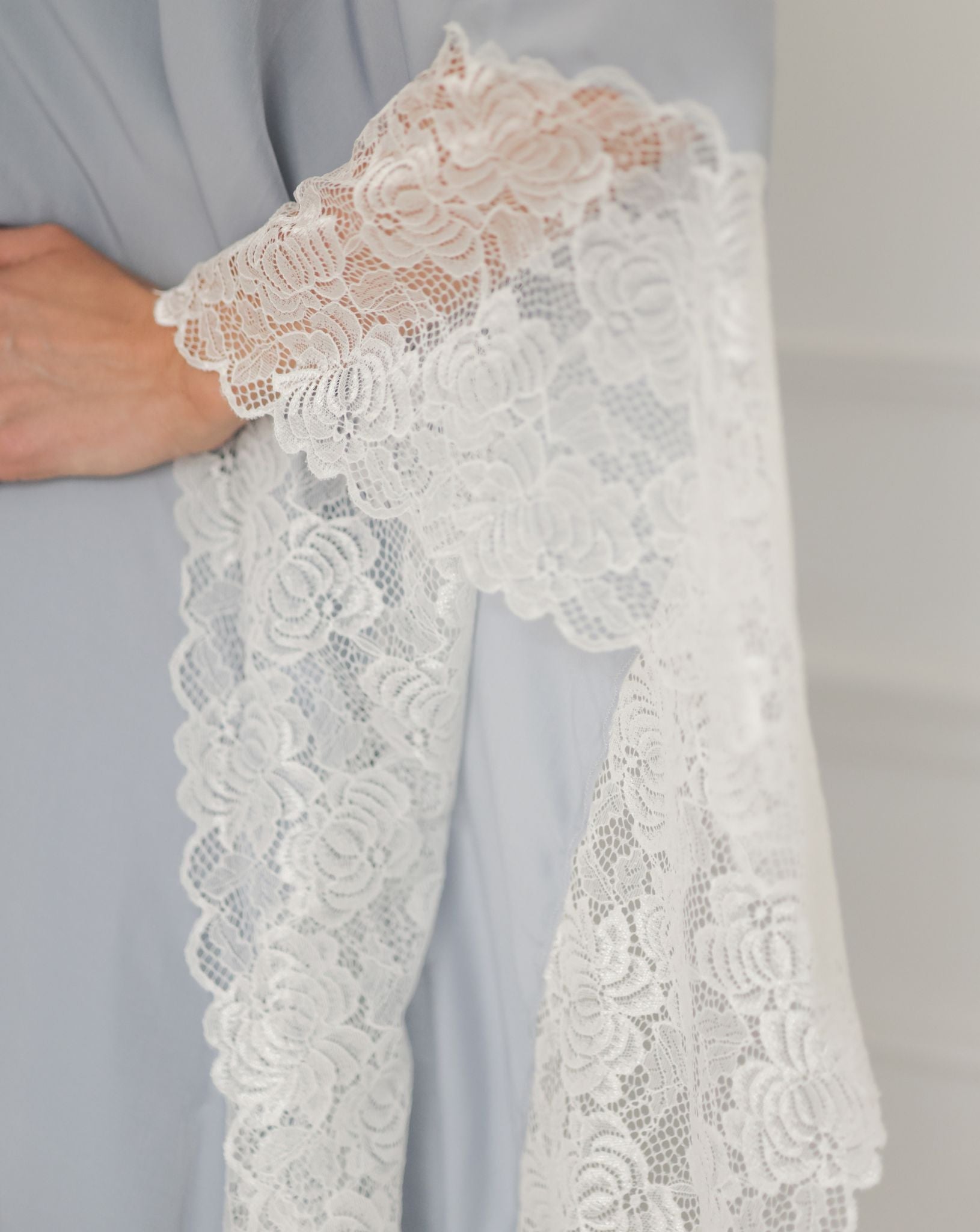 Kafemme maternity kaftan in soft grey with delicate lace shawl detailing.