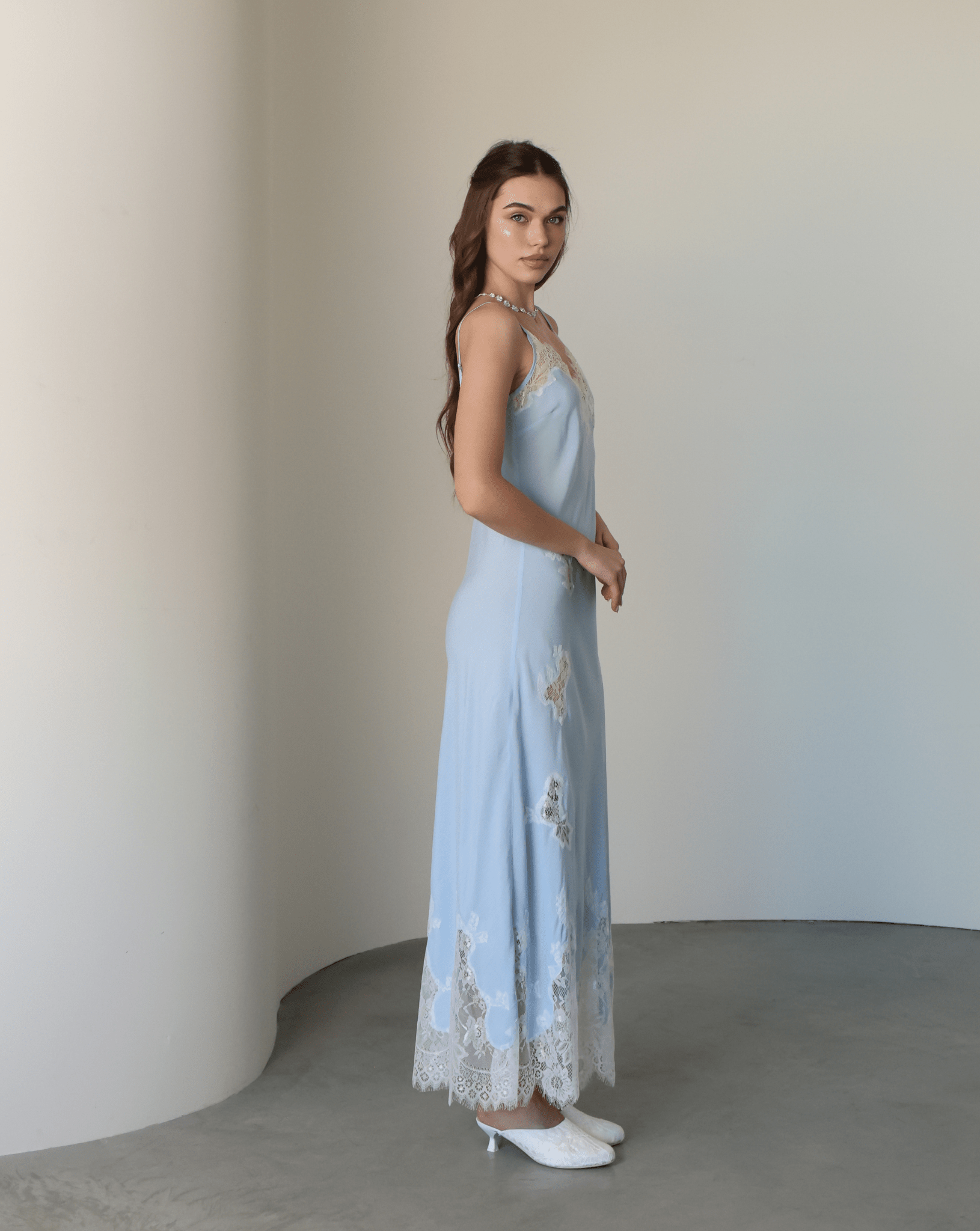 Side perspective of the cotton nightdress, illustrating how the fabric moves effortlessly for ultimate comfort.