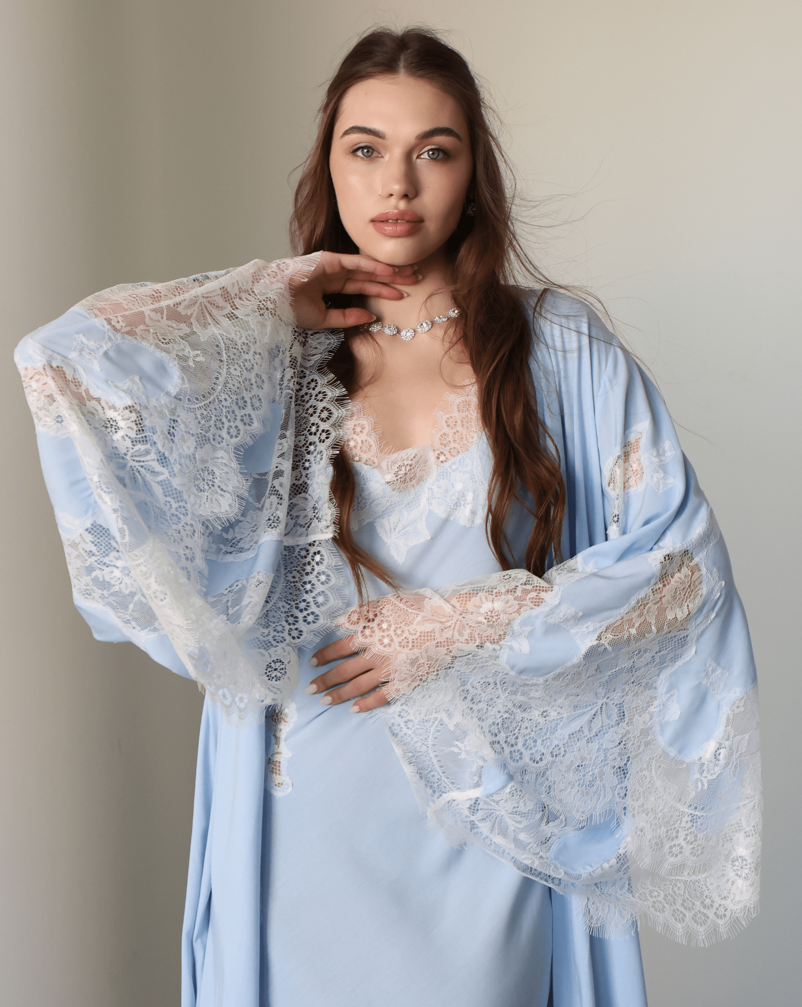 Mid-length shot of the Robe and Nightgown Set, focusing on the contemporary luxury and refined lace embellishments.