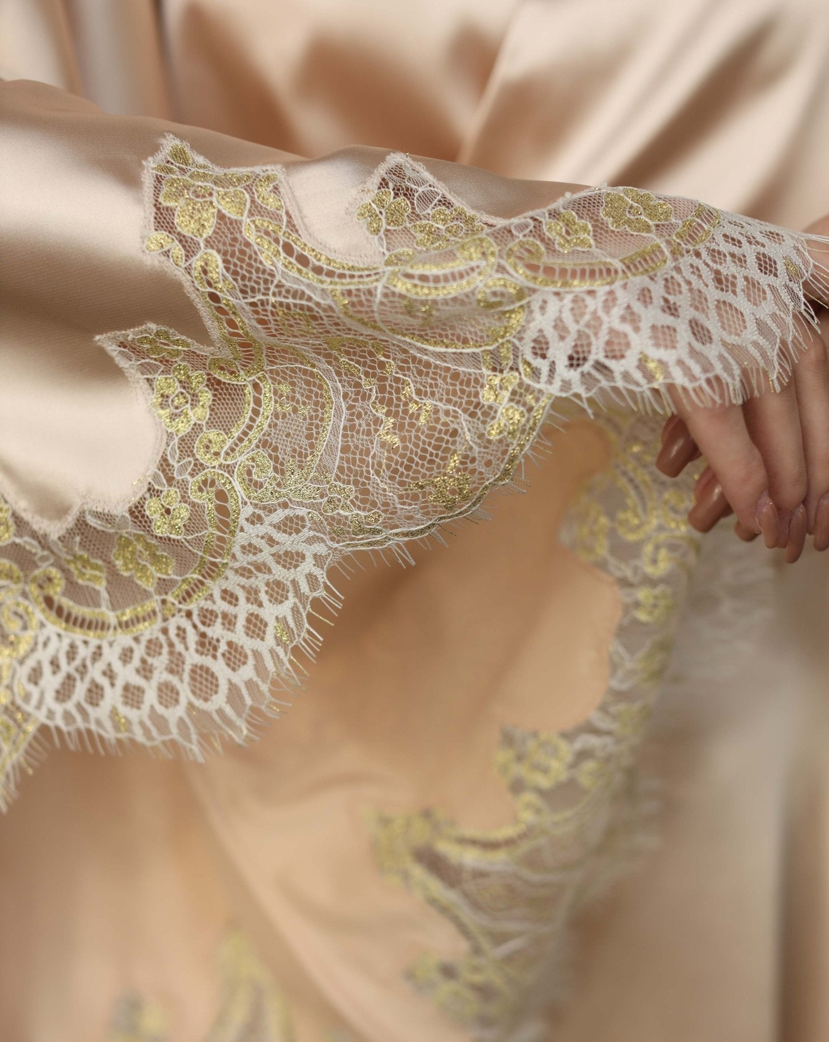 Delicate lace trim on champagne satin robe – close-up of Kafemme craftsmanship