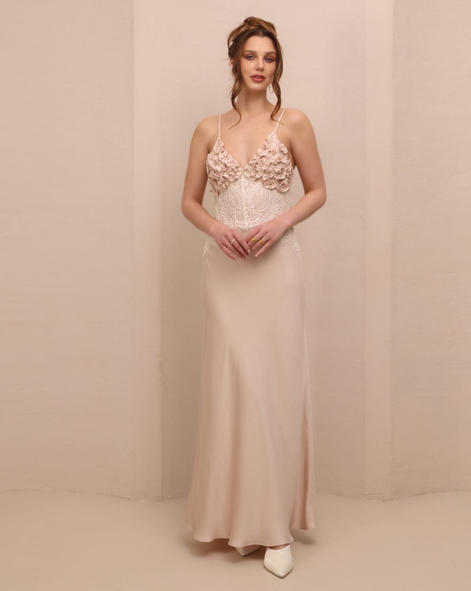Frontal view of the nightgown, featuring ruffled cups and lace inserts that frame the body with refined femininity.