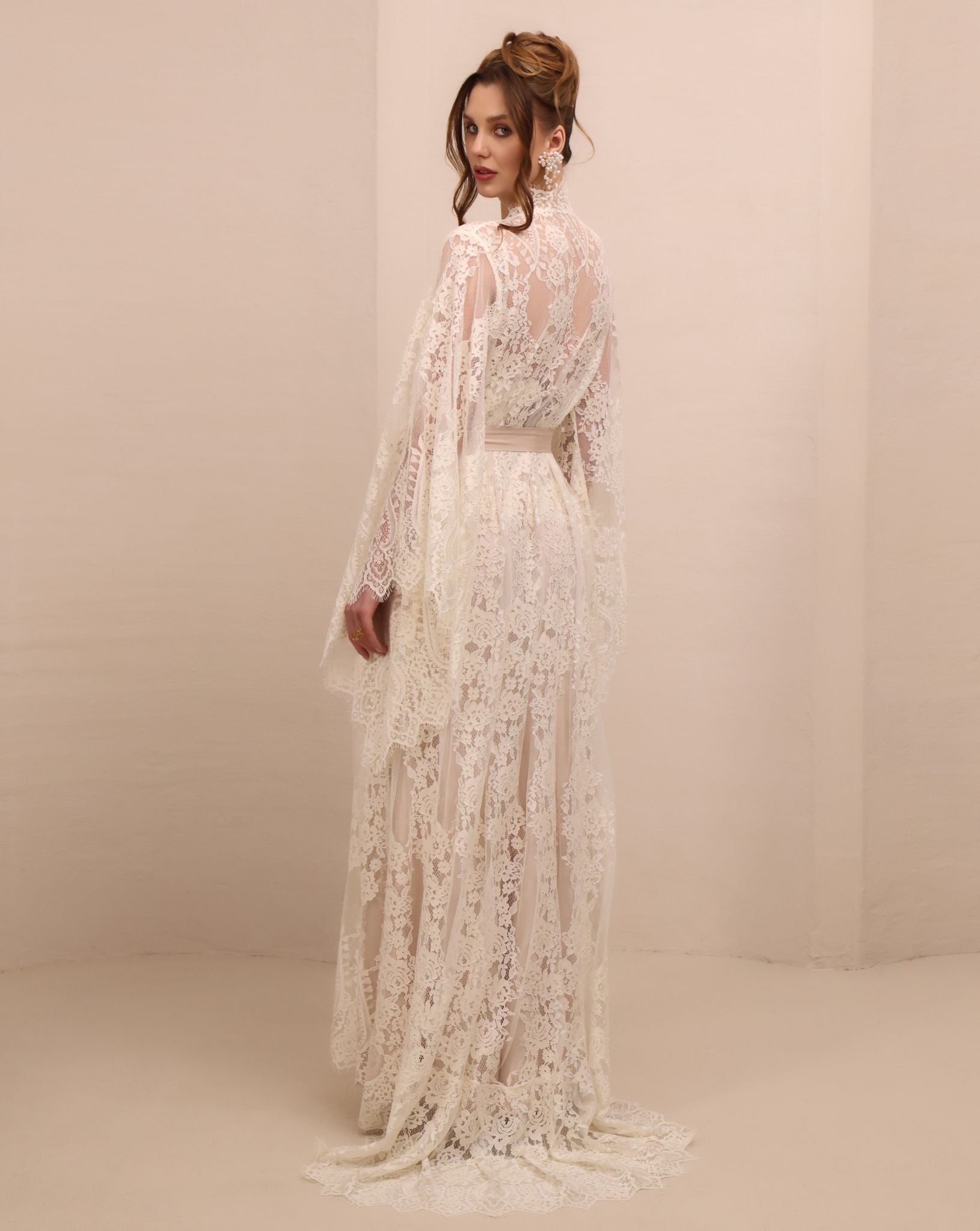 Rear perspective of the full set, showcasing the intricate lace detailing and the elegant length of the train.