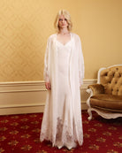 Static full-length view of the elegant white lounge ensemble, showcasing the lightweight natural fabric and serene style.