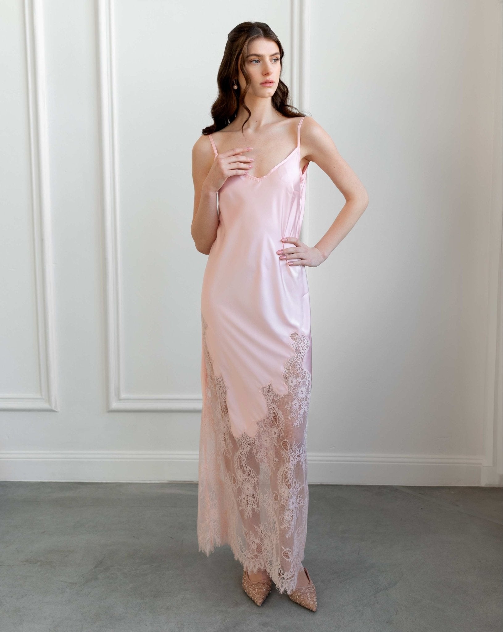 Soft pink lace nightgown with floral appliqués, styled with romantic waves