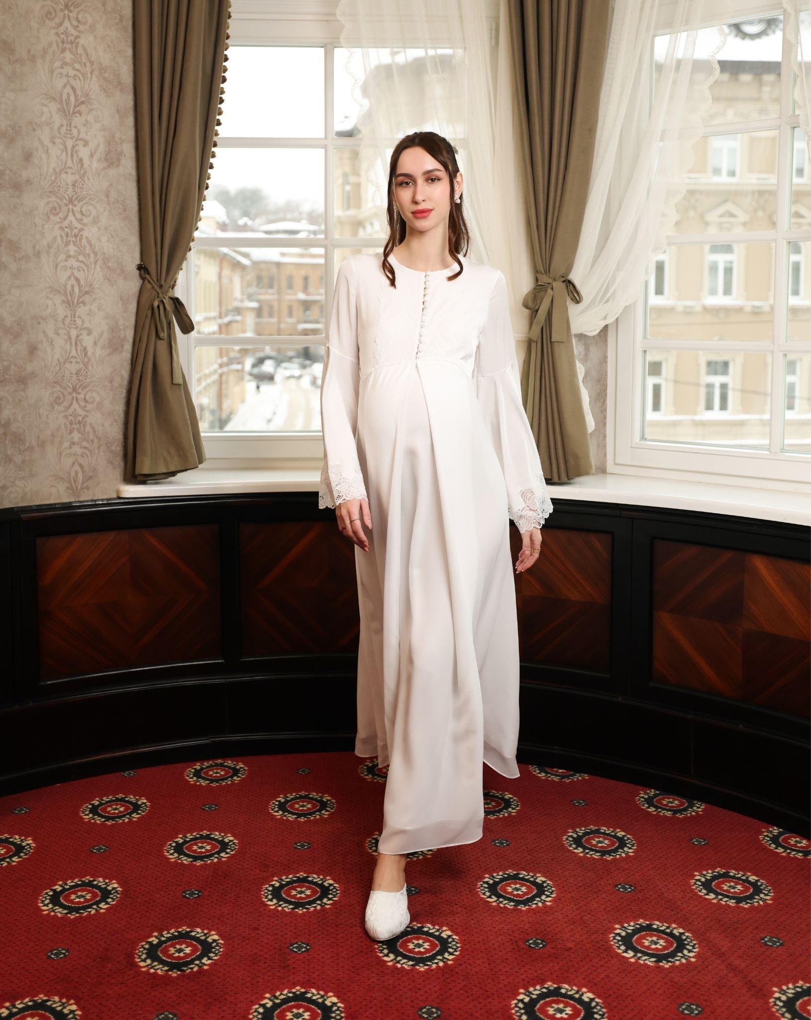 Capturing the airy chiffon layers of the skirt as they fall effortlessly to the floor during movement.