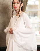 Mid-length shot focusing on the romantic lace-embellished sleeves and the practical buttoned breastfeeding access.