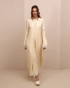 A full-length dynamic view of the flowing skirt, showing how the layered chiffon falls effortlessly to the floor.