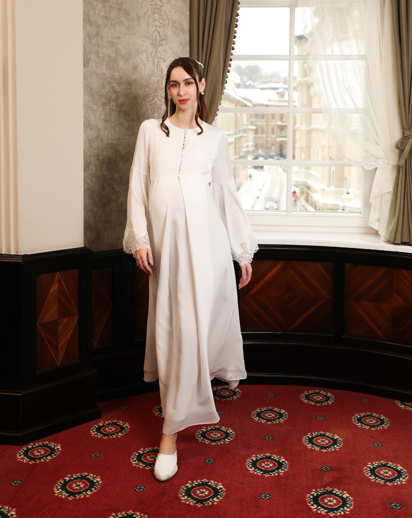 A dynamic view of the Modest Lounge Dress in motion, illustrating the fluid and weightless feel of the fabric.