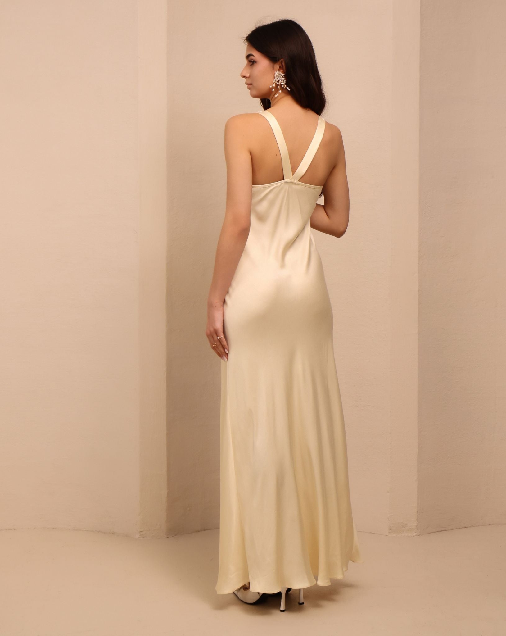 Rear view of the nightdress, highlighting the mid-open back and the natural movement of the lightweight material.