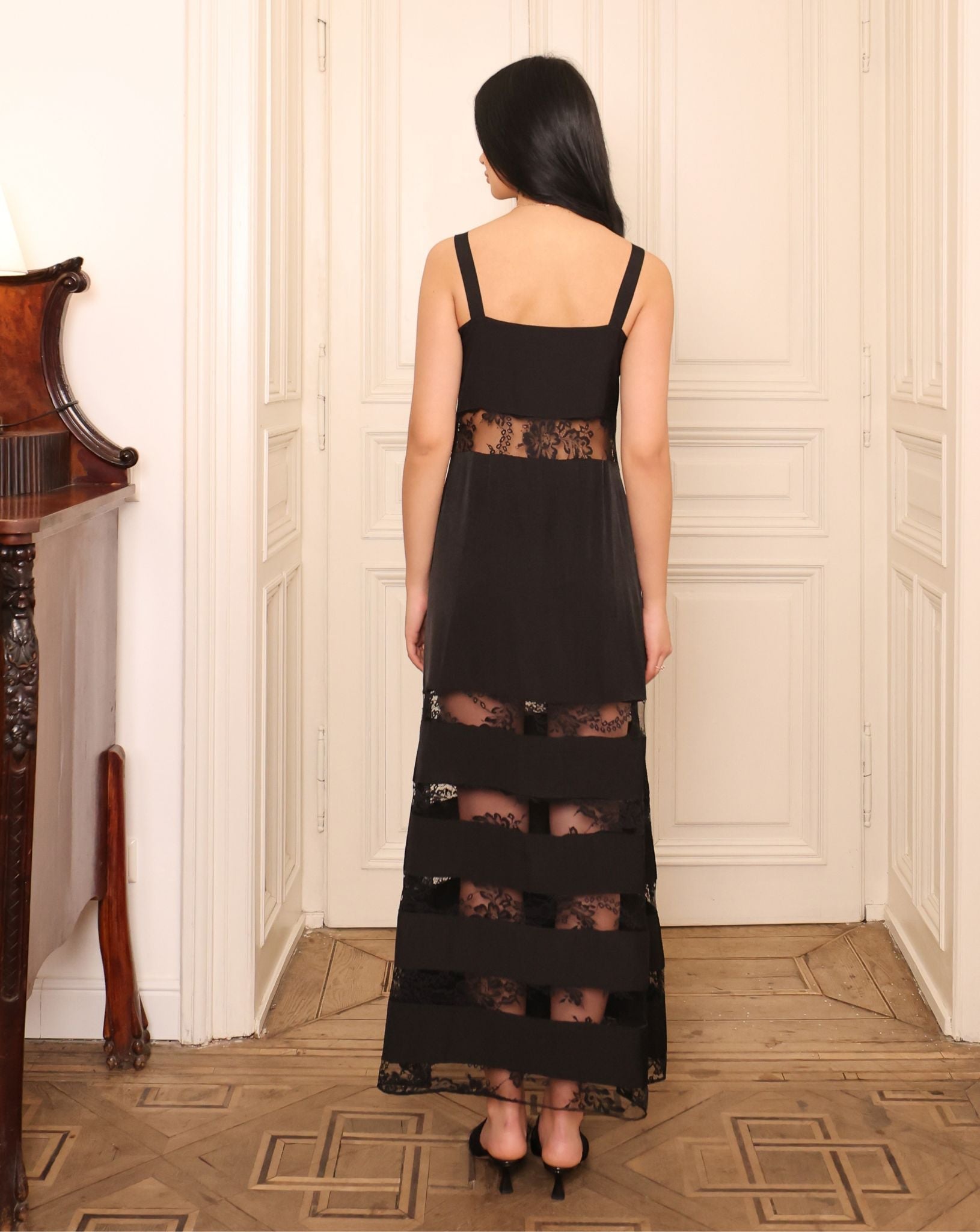 Rear view of the nightgown, showcasing the standard back design and the smooth texture of the natural material.