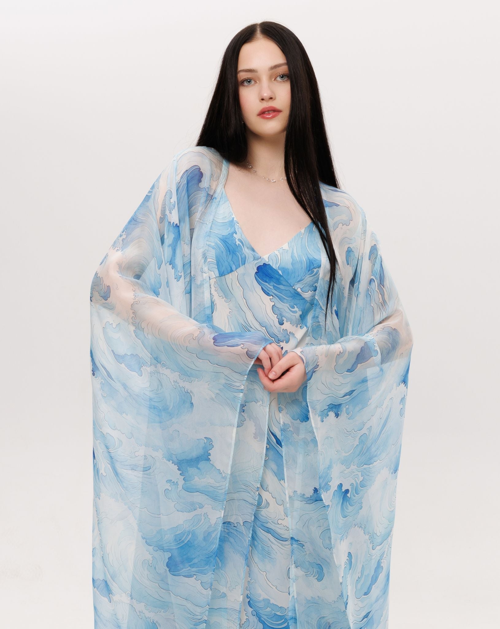 Mid-length shot of the Silk Robe and Nightgown Set, focusing on the airy silk chiffon sleeves and gentle motion.