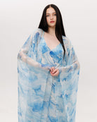 Mid-length shot of the Silk Robe and Nightgown Set, focusing on the airy silk chiffon sleeves and gentle motion.