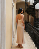 Rear view of the nightdress, showcasing the lace detailing on the back and the adjustable shoulder straps for a perfect fit.