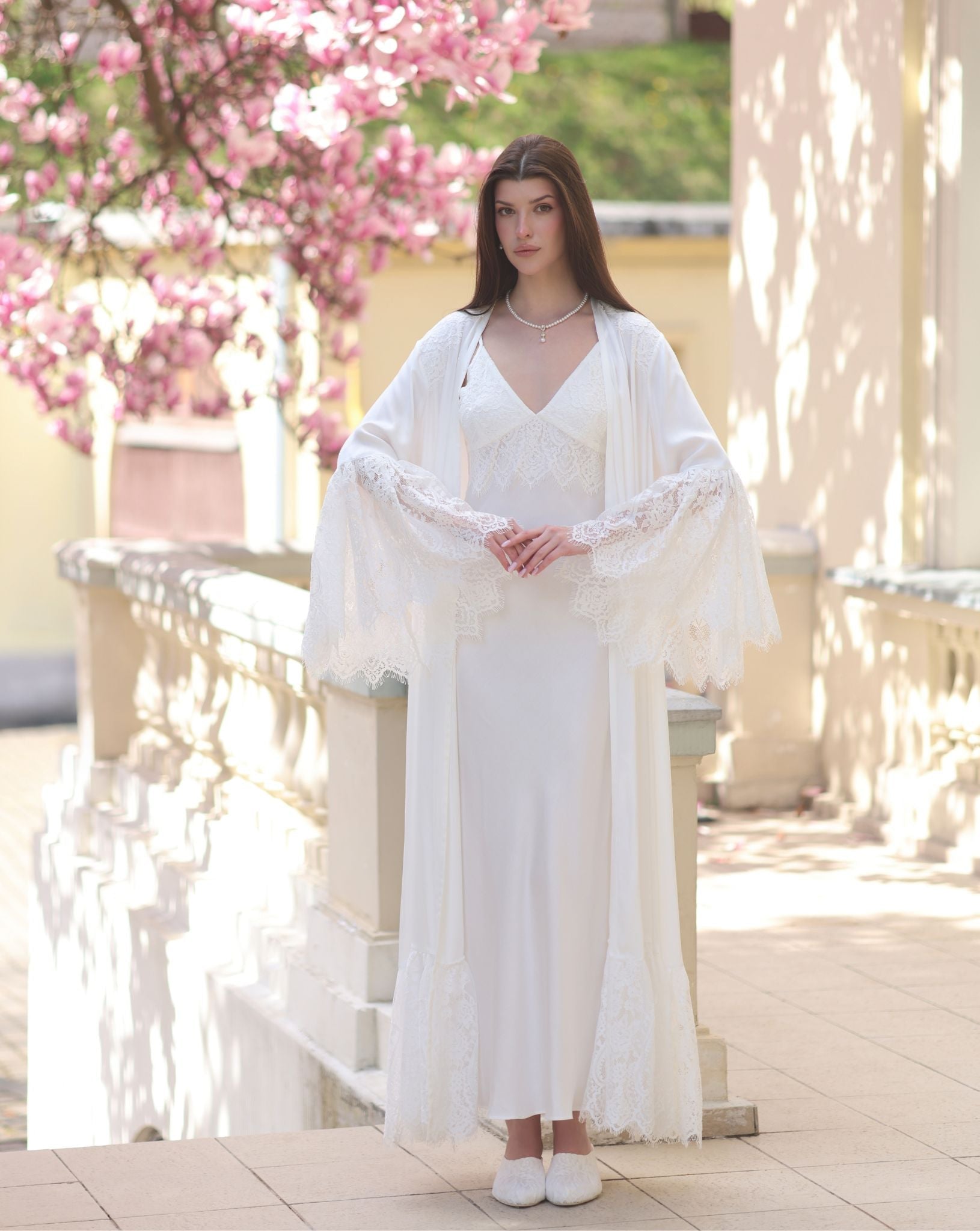 A serene static view of the Robe and Nightgown Set, capturing the graceful elongated silhouette and elegant lace.
