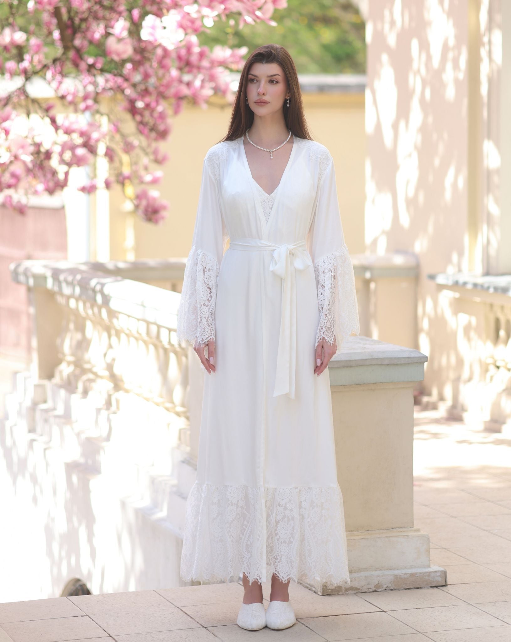 Frontal shot of the ensemble with the robe tied, illustrating the polished look and gentle coverage of the design.