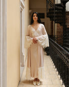 A focused shot of the Robe and Nightgown Set top, highlighting the intricate lace trim on the wide bell sleeves.